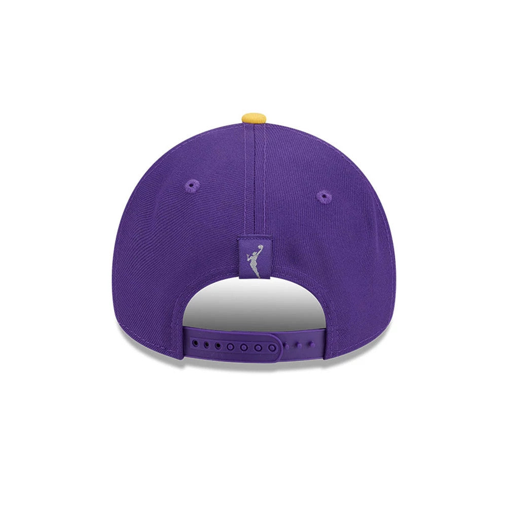 LA Sparks WNBA Tip Off 2026 Purple New Era 9FORTY A-Frame Adjustable Cap, rear view showing a silver embroidered WNBA logo on the purple tab above the snapback closure, with purple eyelets and a contrasting yellow top button.