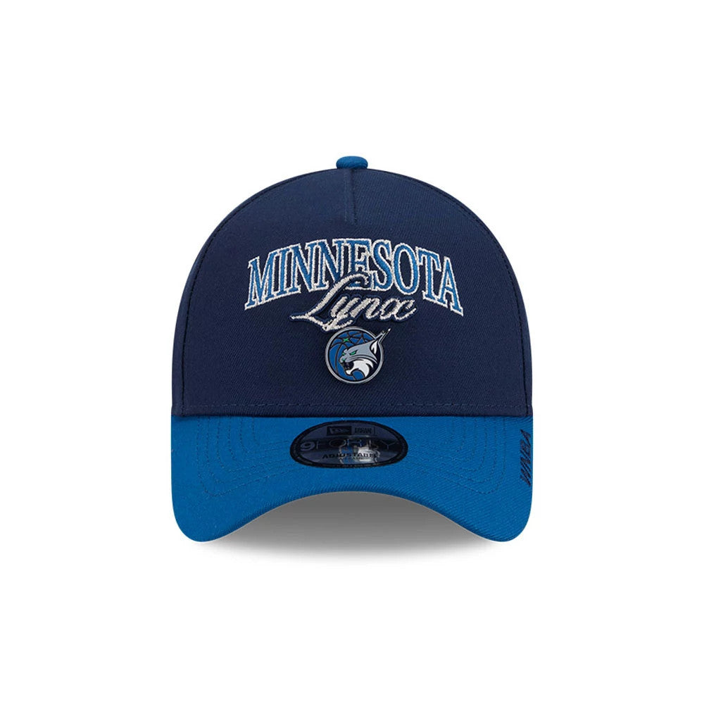 Minnesota Lynx WNBA Tip Off 2026 Navy New Era 9FORTY A-Frame Adjustable Cap, front view showing raised white and light blue embroidered Minnesota Lynx logo on the navy crown, with a contrasting blue visor and a 9FORTY size sticker on the top.