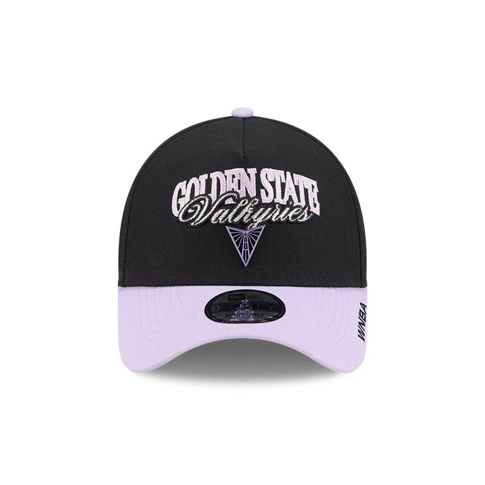 Golden State Valkyries WNBA Tip Off 2026 Black New Era 9FORTY A-Frame Adjustable Cap, front view showing white and lavender embroidered lettering on the structured black crown, a lilac curved visor, and a 9FORTY size sticker on top.