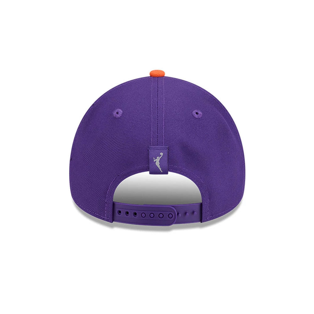 Phoenix Mercury WNBA Tip Off 2026 Purple New Era 9FORTY A-Frame Adjustable Cap, rear view showing the WNBA logo embroidered at the centre of the back panels above the purple snap closure and an orange top button on the structured purple crown.