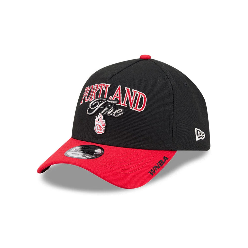WNBA Portland Fire Tip Off 2026 Red New Era 9FORTY A-Frame Adjustable Cap, three-quarter view showing the raised Portland Fire logo embroidered in red and white on the front panel, with a contrasting red curved visor and a 9FORTY size sticker.