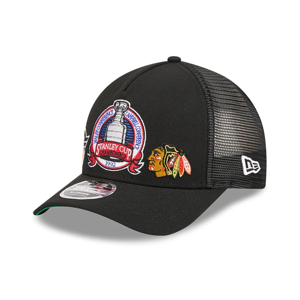 Penguins NHL Stanley Cup Black New Era 9FORTY M-Crown A-Frame Trucker Adjustable Cap, three-quarter view showing the large embroidered Stanley Cup logo on the front panel, with a red centre and black visor featuring a 9FORTY size sticker.