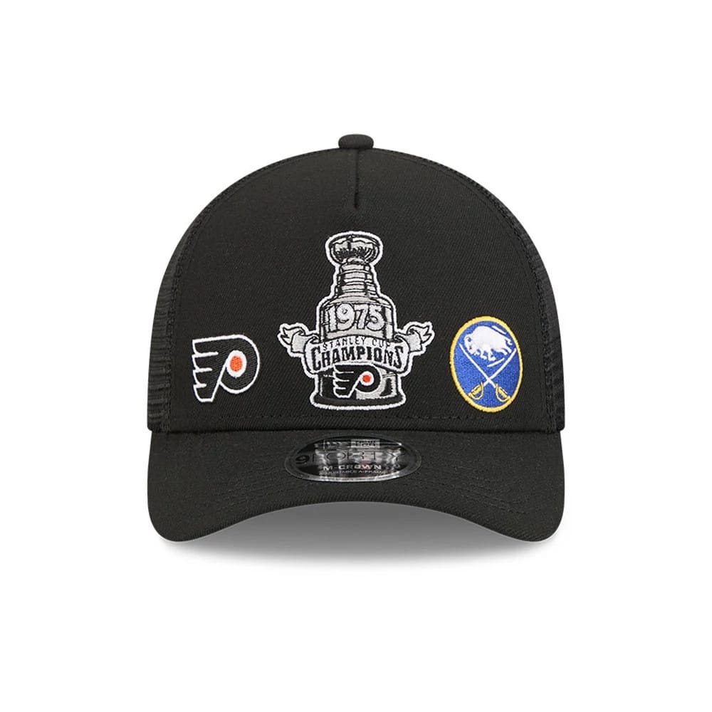 Flyers NHL Stanley Cup Black New Era 9FORTY M-Crown A-Frame Trucker Adjustable Cap, front view showing embroidered 1975 Stanley Cup Champions graphic on the front panel, flanked by Flyers and Sabres logos.