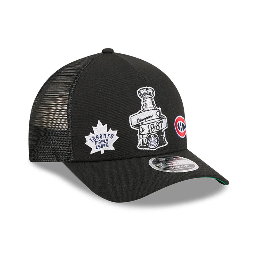 Maple Leafs NHL Stanley Cup Black New Era 9FORTY M-Crown A-Frame Trucker Adjustable Cap, three-quarter view showing a white embroidered Stanley Cup graphic on the front panel, alongside a Toronto Maple Leafs logo.