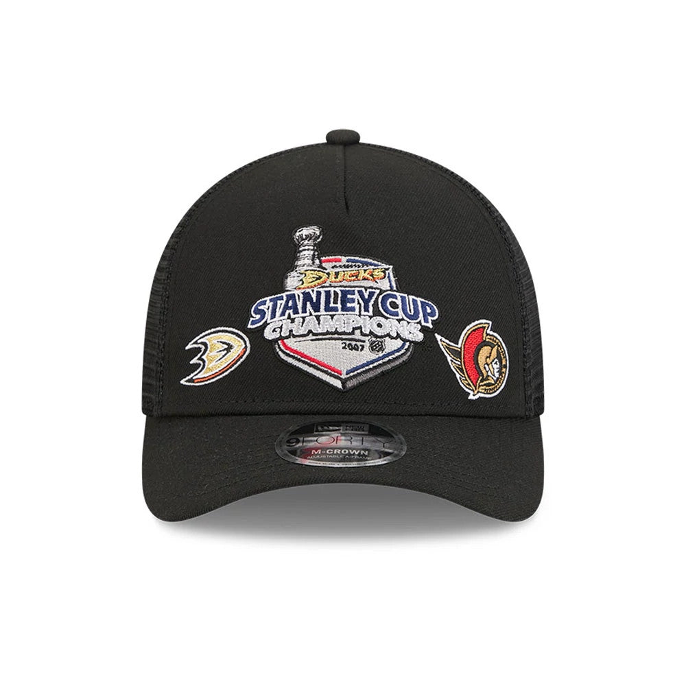 Pictured is this NHL Stanley Cup Champions Anaheim Ducks 9FORTY M-Crown A-Frame Trucker Adjustable cap in black. 3
