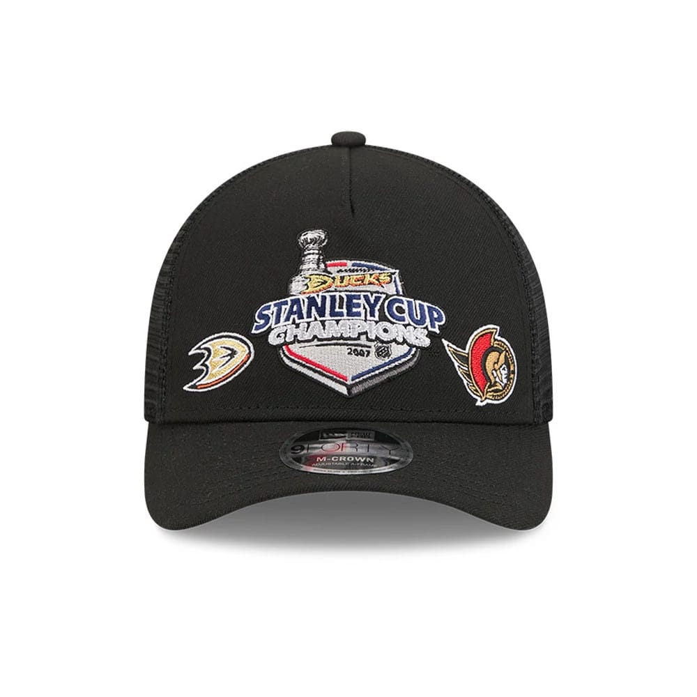 Pictured is this NHL Stanley Cup Champions Anaheim Ducks 9FORTY M-Crown A-Frame Trucker Adjustable cap in black. 3