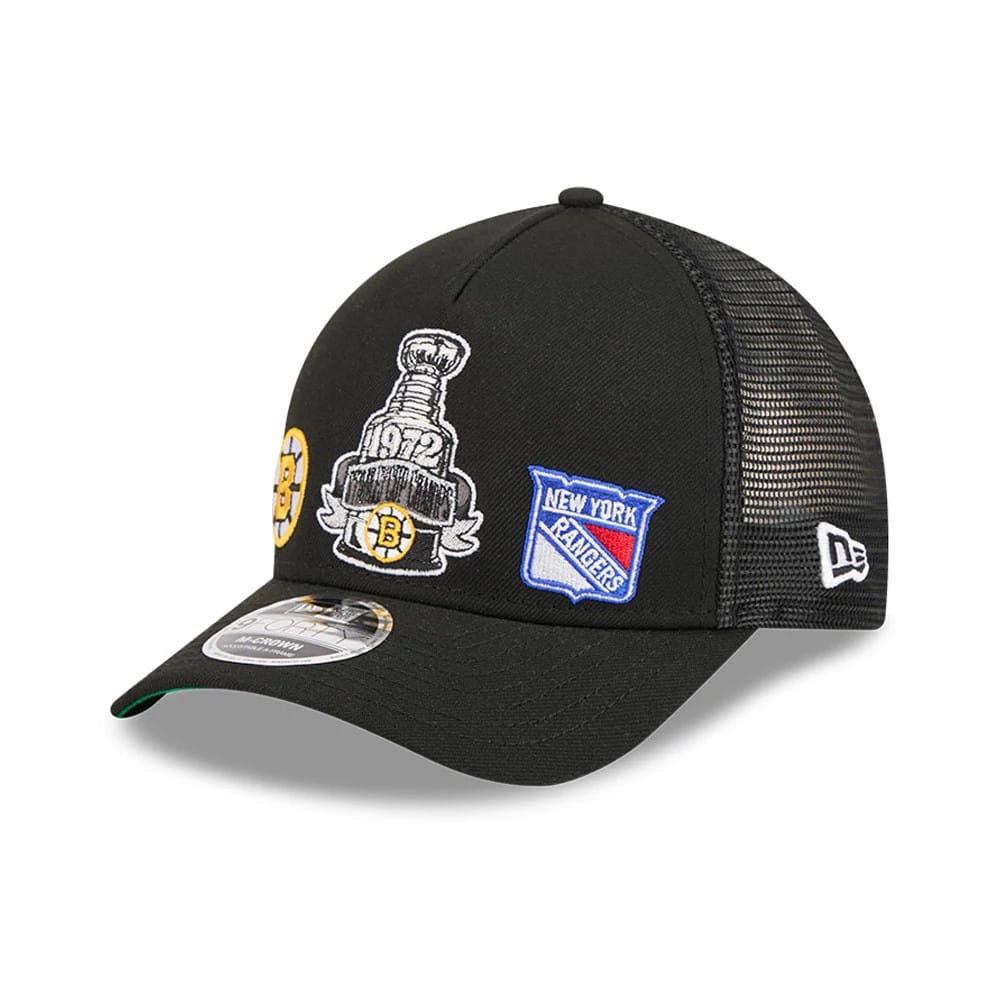 Bruins NHL Stanley Cup Black New Era 9FORTY M-Crown A-Frame Trucker Adjustable Cap, front view showing embroidered Stanley Cup and New York Rangers patches on the structured front panels, with a pre-curved black visor and 9FORTY size sticker.