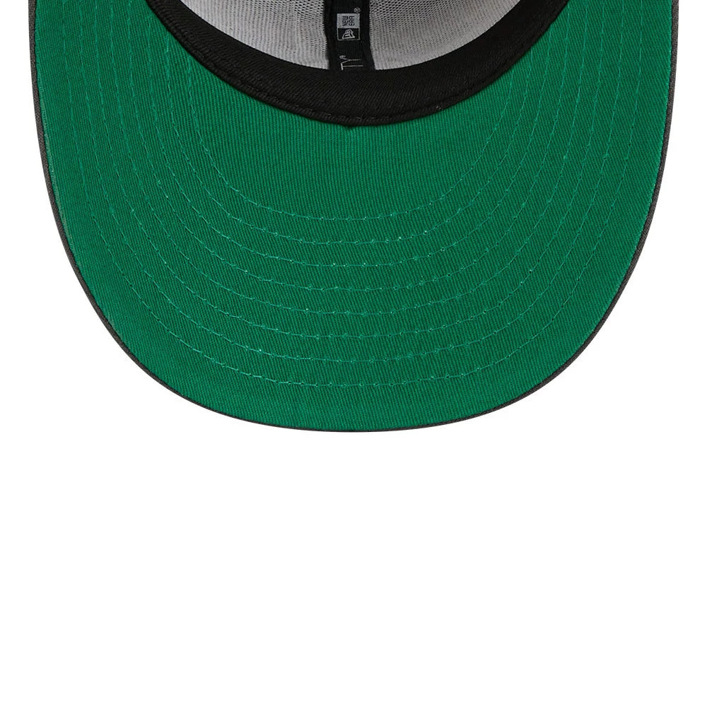 New York Islanders NHL Stanley Cup Champions Dark Grey New Era 59FIFTY Fitted Cap, inside view showing green undervisor, black sweatband, and grey taping with a New Era logo print along the seam of the structured crown.