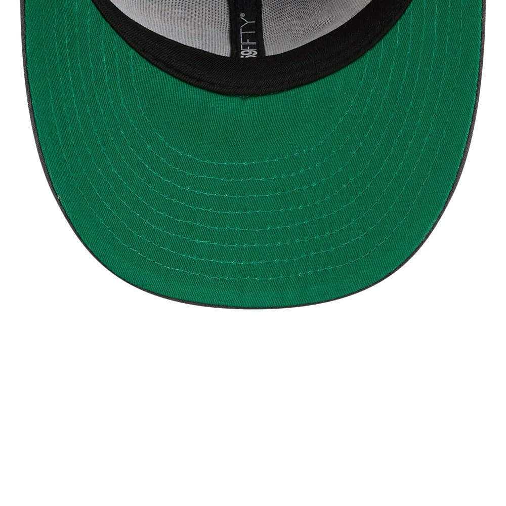 New York Rangers NHL Stanley Cup Champions Dark Grey New Era 59FIFTY Fitted Cap, inside view showing a green undervisor, black sweatband, and grey taping with a 59FIFTY logo along the seam, highlighting the cap’s construction details.