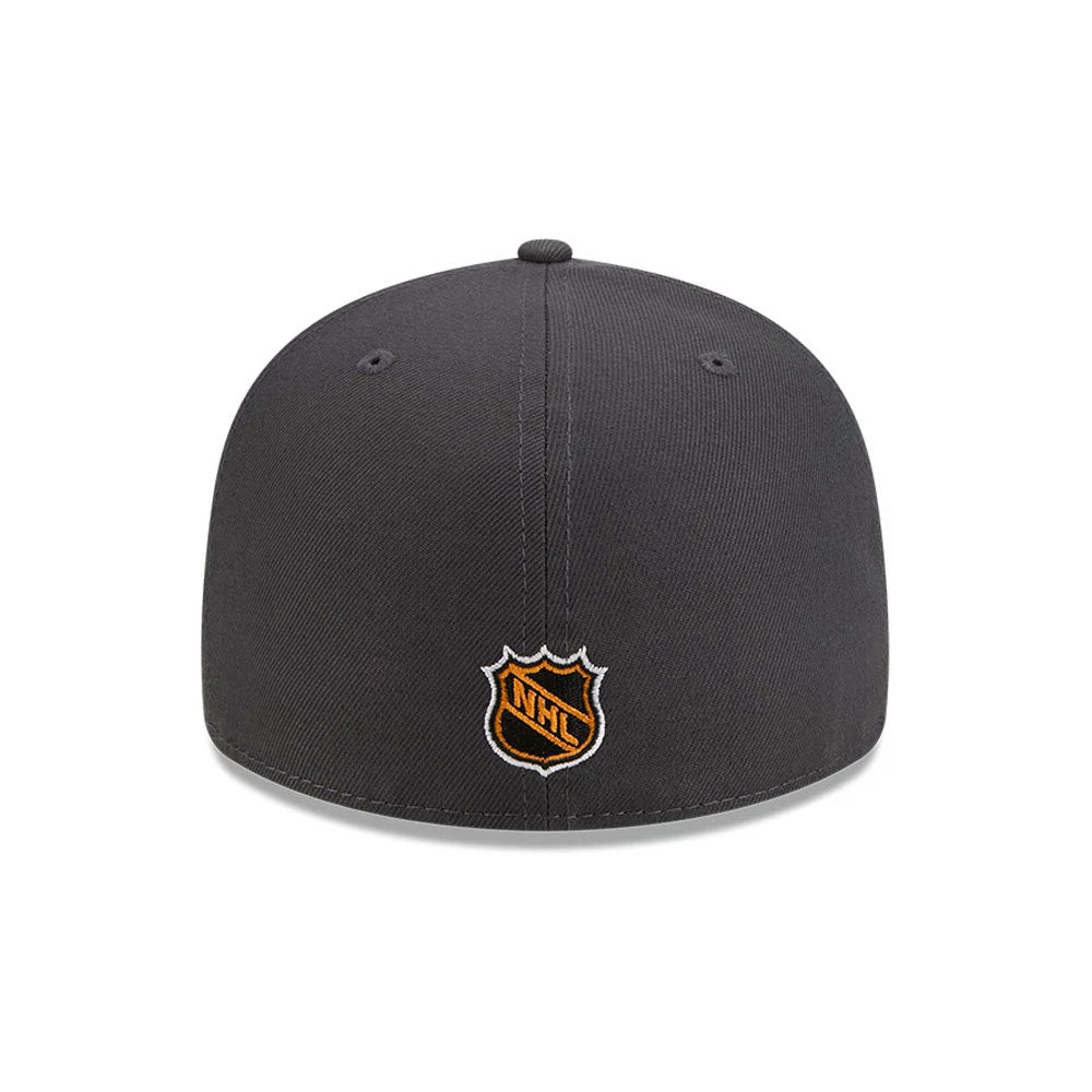 Toronto Maple Leafs NHL Stanley Cup Champions Dark Grey New Era 59FIFTY Fitted Cap, rear view showing the orange and black embroidered NHL shield logo at the centre of the back panels, complemented by the structured dark grey crown and top button.