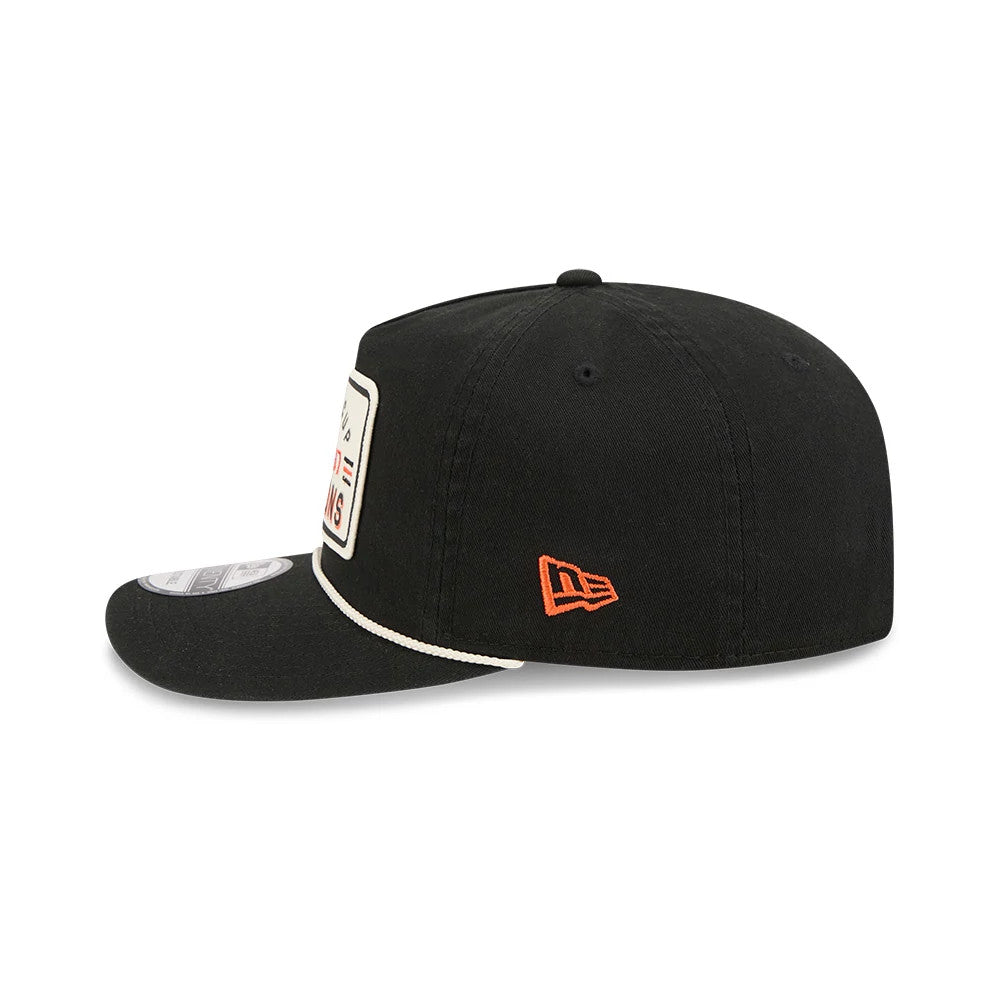 Anaheim Ducks NHL Stanley Cup Champions Black New Era 19TWENTY Adjustable Cap, side view showing the orange New Era flag logo embroidered on the left side, a structured black crown, and a flat visor with a white edge trim and a 19TWENTY size sticker.