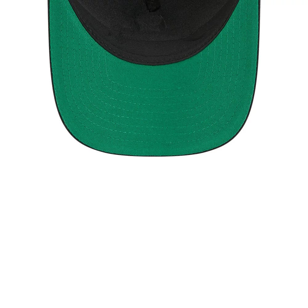 Canadiens NHL Stanley Cup Black New Era 9FORTY M-Crown A-Frame Trucker Adjustable Cap, close-up showing the green undervisor beneath the structured black crown and black visor, highlighting the detailed stitching on the curved visor edge.