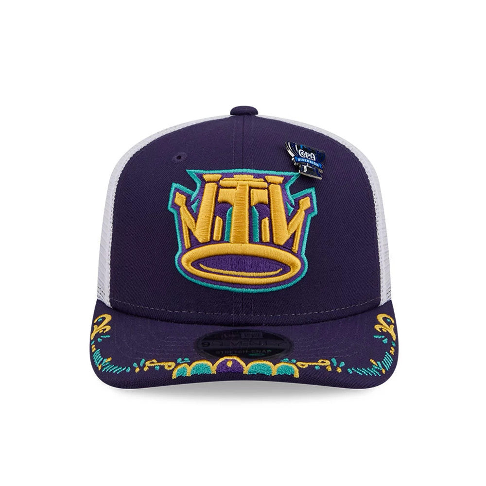 Cyclones MiLB La Copa 2026 Purple New Era 9SEVENTY Stretch Snap Adjustable Cap, front view showing a large yellow and teal embroidered crown logo on the purple front panel, with decorative embroidery on the visor and a purple 9SEVENTY size sticker.
