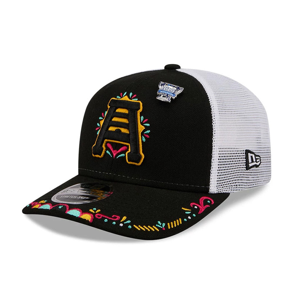 SLC Bee MiLB La Copa 2026 Black New Era 9SEVENTY Stretch Snap Adjustable Cap, front view showing a large embroidered yellow A logo with colourful floral accents, a La Copa patch above, and a embroidered design on the curved black visor.