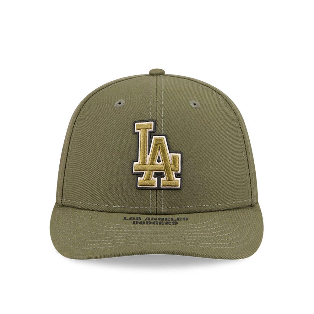 LA Dodgers MLB Armed Forces Day 2026 Green Low Profile New Era 59FIFTY Fitted Cap, front view showing a raised gold and black embroidered LA logo on the structured green crown, with Los Angeles Dodgers text on the curved visor.
