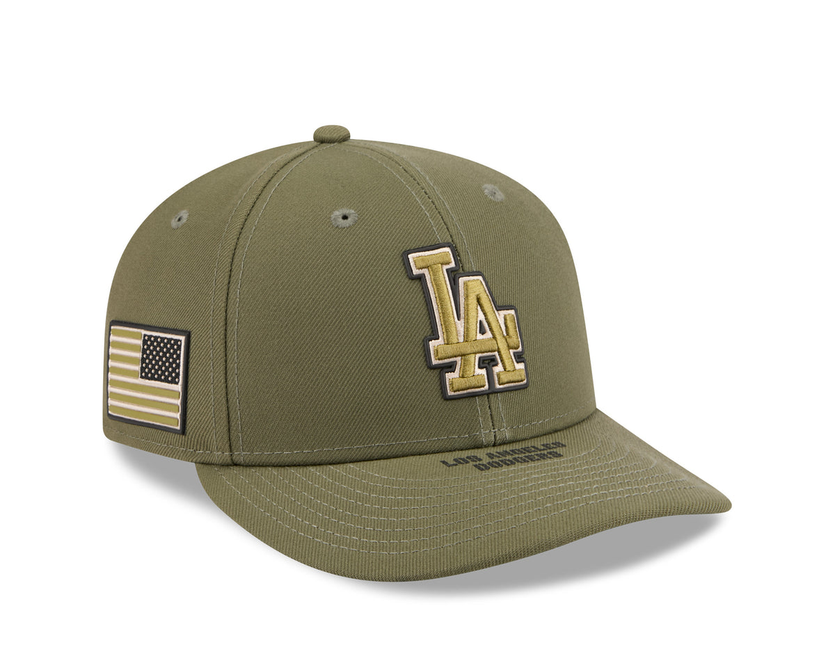 LA Dodgers MLB Armed Forces Day 2026 Green Low Profile New Era 59FIFTY Fitted Cap, front view showing the raised gold LA logo on the front panel, American flag patch on the right side, and flat green visor with matching stitching.