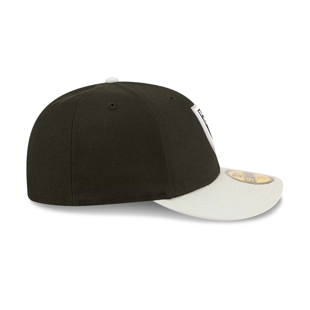 Las Vegas Raiders NFL Draft 2026 Black New Era 59FIFTY Fitted Cap, side view showing the black structured crown with black eyelets, a grey flat visor featuring a gold 59FIFTY size sticker and a white top button.
