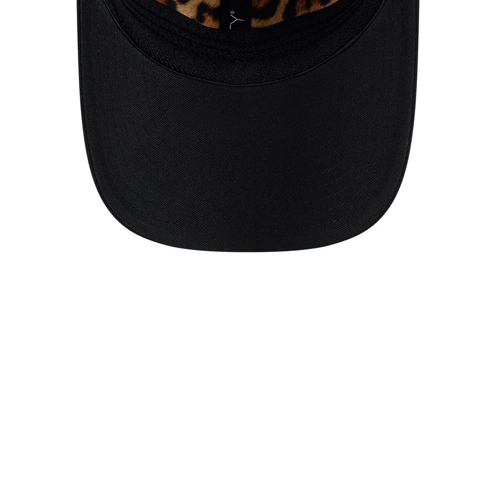 Jaguars NFL Draft 2026 Turquoise New Era 39THIRTY M-Crown Stretch Fit Cap, top view showing the black curved visor, a small New Era flag logo on the leopard print fabric beneath, and the structured front of the crown.