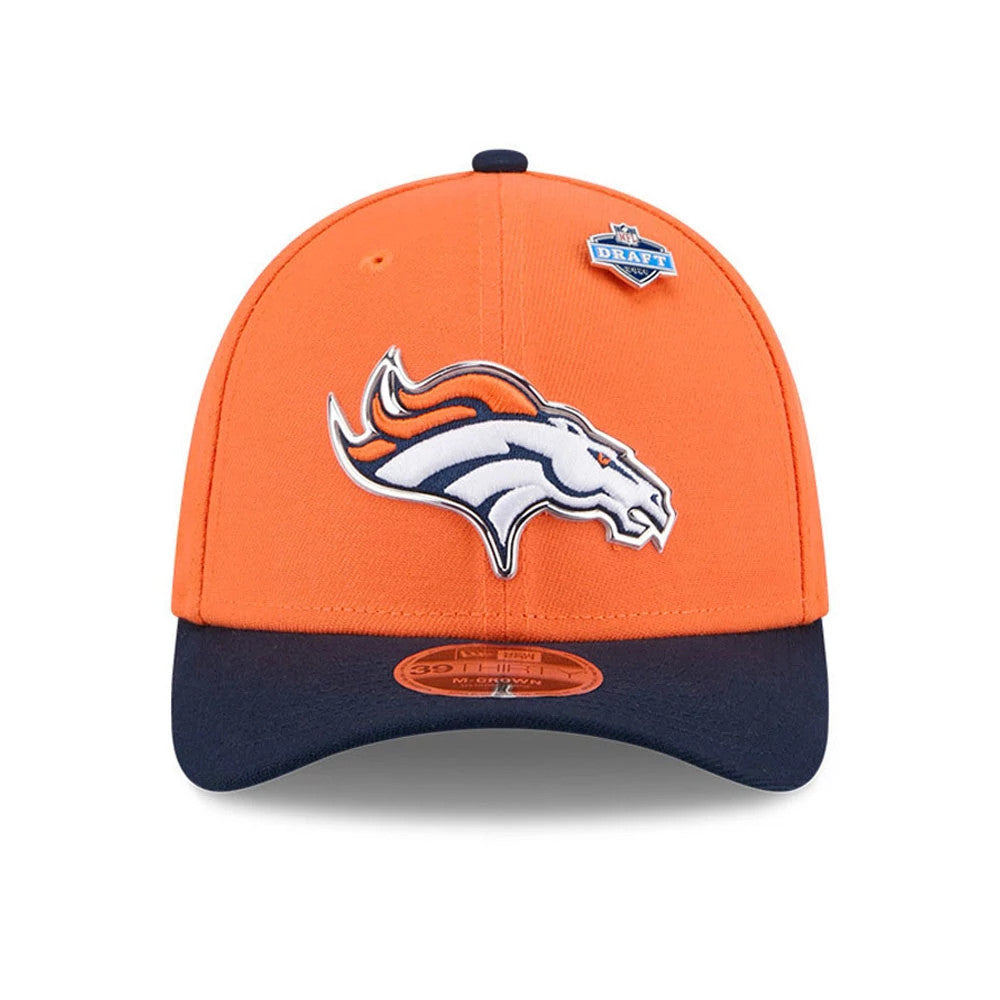 Broncos NFL Draft 2026 Orange New Era 39THIRTY M-Crown Stretch Fit Cap, front view showing the raised embroidered Broncos logo on the orange crown, a contrasting navy visor, and a 39THIRTY size sticker on the visor.