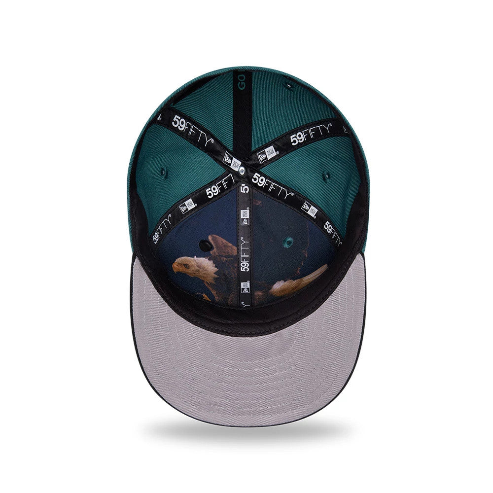 Philadelphia Eagles NFL Draft 2026 Dark Green New Era 59FIFTY Fitted Cap, inside view showing the bald eagle graphic on the inner panels, coupled with black 59FIFTY taping and a grey undervisor.