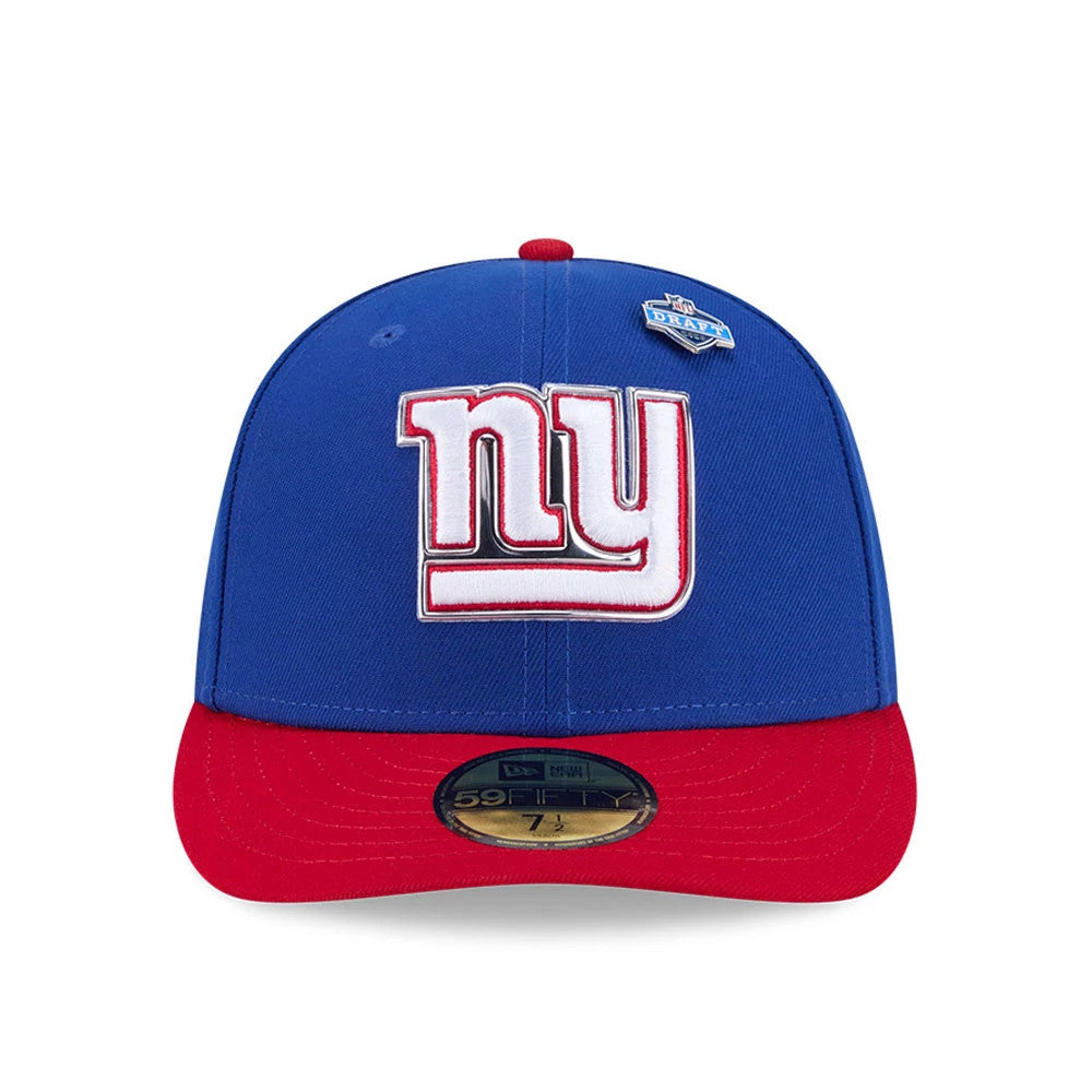 New York Giants NFL Draft 2026 Blue New Era 59FIFTY Fitted Cap, front view showing the raised embroidered white and red ny logo on blue front panels, a matching NFL Draft pin above, and a contrasting red visor with a gold 59FIFTY size sticker.
