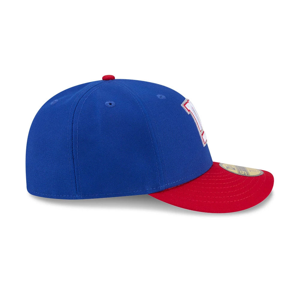 New York Giants NFL Draft 2026 Blue New Era 59FIFTY Fitted Cap, side view showing the white and red embroidered front panel logo, a red flat visor, and a gold 59FIFTY size sticker, with a red top button and matching eyelets on the blue crown.