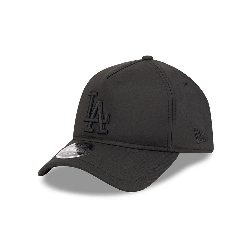 LA Dodgers MLB Quickstrike Black on Black New Era 9FORTY Apex Adjustable Cap, three-quarter view showing the raised black LA logo embroidered on the front panel, a curved black visor with a 9FORTY size sticker.