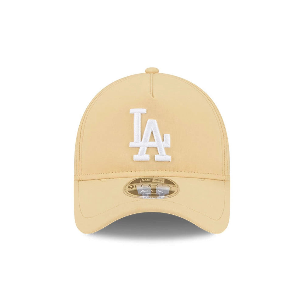 LA Dodgers MLB Quickstrike Yellow New Era 9FORTY Apex Adjustable Cap, front view showing a white embroidered LA logo on the structured yellow crown, with a curved visor and a 9FORTY size sticker on the centre.