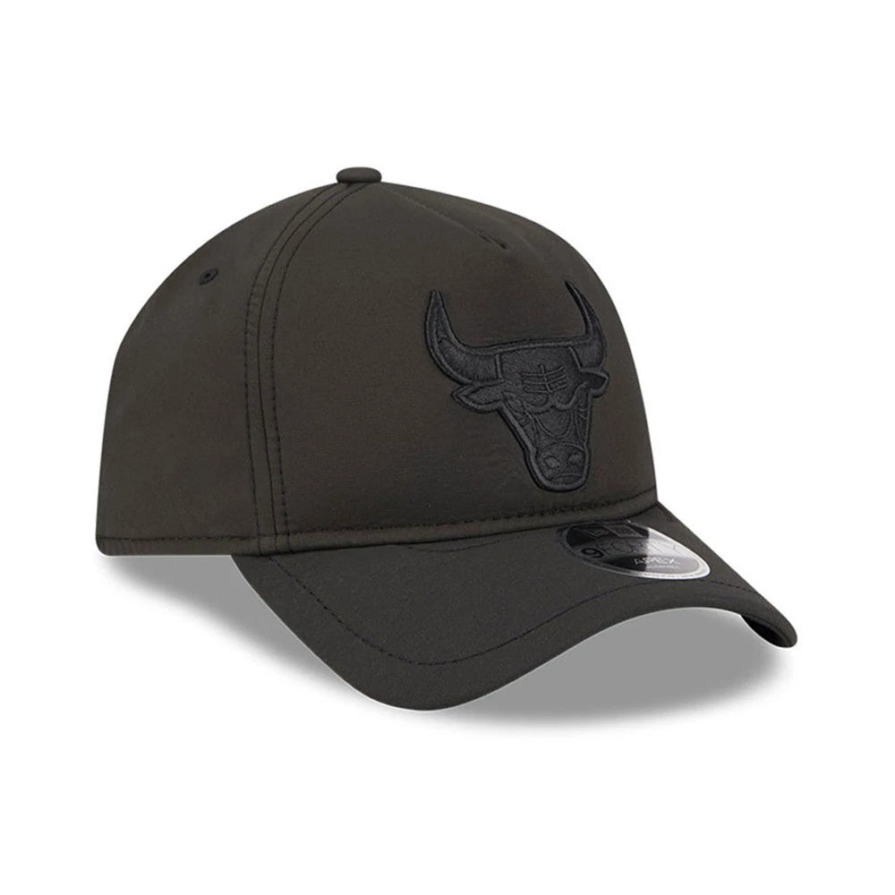 Chicago Bulls NBA Quickstrike Black on Black New Era 9FORTY Apex Adjustable Cap, three-quarter view showing the black raised embroidered Bulls logo on the front panel, with a curved black visor and a 9FORTY size sticker on the visor.