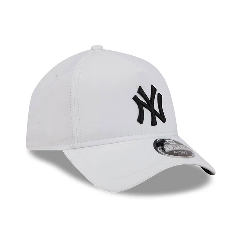 New York Yankees MLB Quickstrike White New Era 9FORTY Apex Adjustable Cap, three-quarter view showing the black raised embroidered NY logo on the front panel, curved white visor with a 9FORTY size sticker, and small top button.