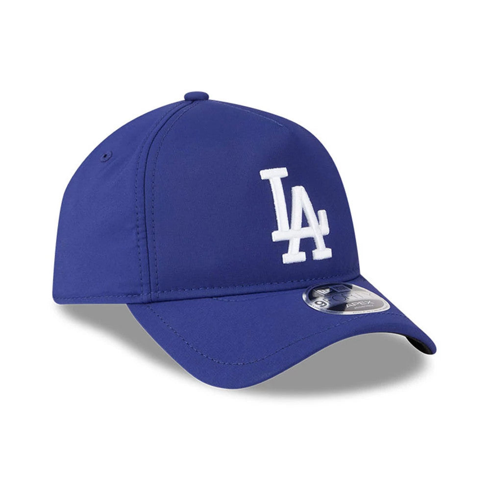 LA Dodgers MLB Quickstrike Dark Blue New Era 9FORTY Apex Adjustable Cap, three-quarter view showing the raised white embroidered LA logo on the structured dark blue crown, curved visor with a 9FORTY size sticker, and matching top button.