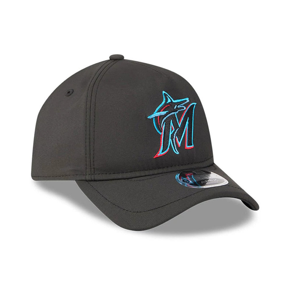 Miami Marlins MLB Quickstrike Black New Era 9FORTY Apex Adjustable Cap, three-quarter view showing raised cyan and red team logo embroidered on the front panel, curved black visor, and 9FORTY size sticker on the visor's left side.
