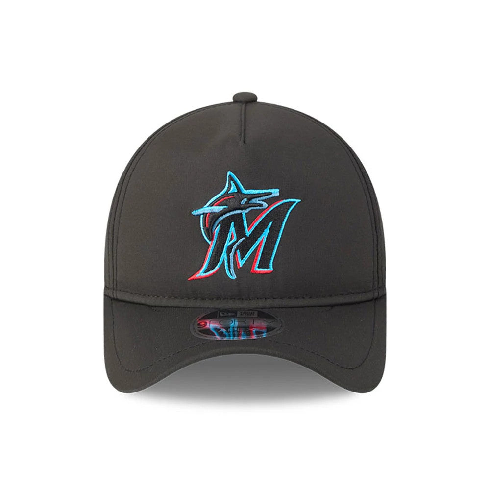 Miami Marlins MLB Quickstrike Black New Era 9FORTY Apex Adjustable Cap, front view showing the raised turquoise and red embroidered Marlins logo on the black front panel, with a matching black curved visor and clear 9FORTY size sticker on the visor.