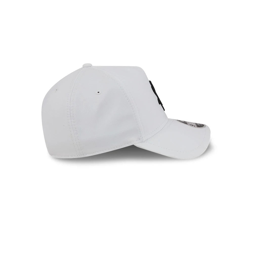 Chicago White Sox MLB Quickstrike White New Era 9FORTY Apex Adjustable Cap, side view showing the structured white crown with two small ventilating eyelets, a slightly curved visor, and the New Era flag logo embroidered on the left side.