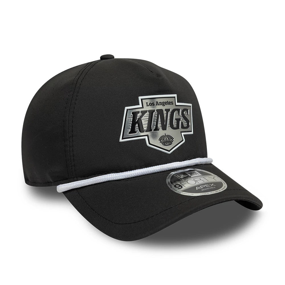 LA Kings NHL Quickstrike Black New Era 9FORTY Apex Adjustable Cap, three-quarter view showing the Los Angeles Kings logo in raised embroidery on the front panel, curved black visor with a grey undervisor and 9FORTY size sticker.