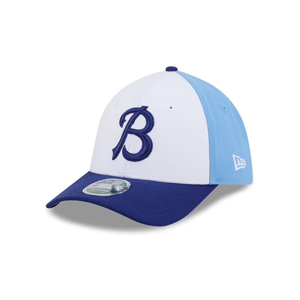 Buffalo Bisons MiLB On Field Blue New Era 39THIRTY M-Crown Stretch Fit Cap, three-quarter view showing the raised blue B logo on the white front panel, the contrasting light blue side panels, and the matching blue New Era flag on the left side.