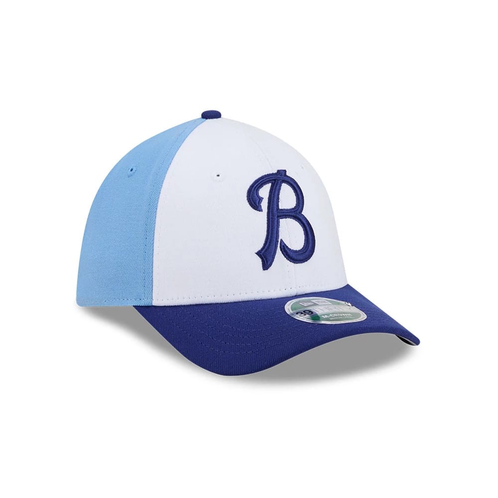 Buffalo Bisons MiLB On Field Blue New Era 39THIRTY M-Crown Stretch Fit Cap, three-quarter view showing a raised blue embroidered B logo on the white front panel, a blue curved visor with a 39THIRTY size sticker, and light blue side panels.