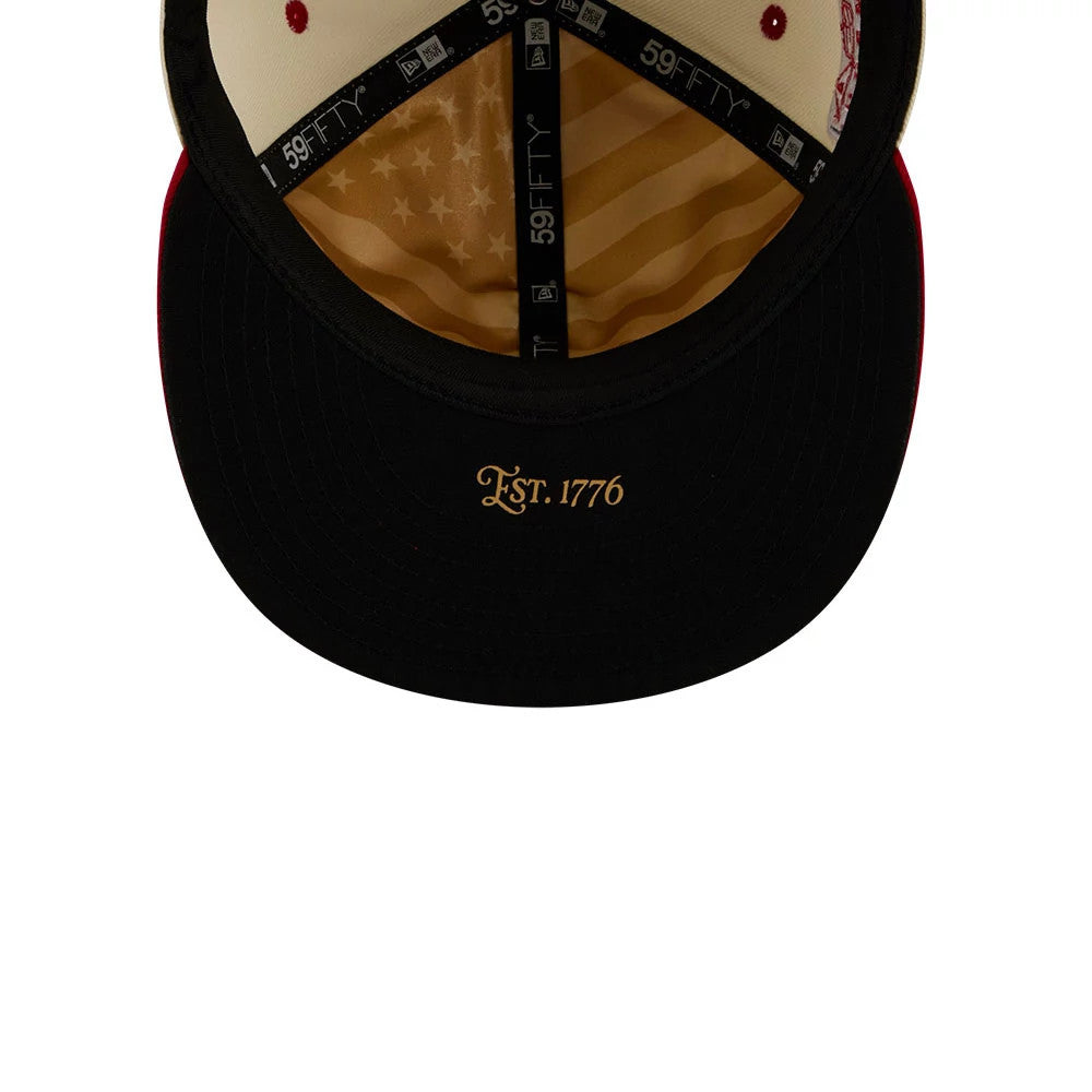 Chicago White Sox MLB 4th Of July 2026 Cream New Era 59FIFTY Fitted Cap, inside view showing a black visor with Est. 1776 in gold, black 59FIFTY taping across the seams, and a gold patterned undervisor with stars and stripes.