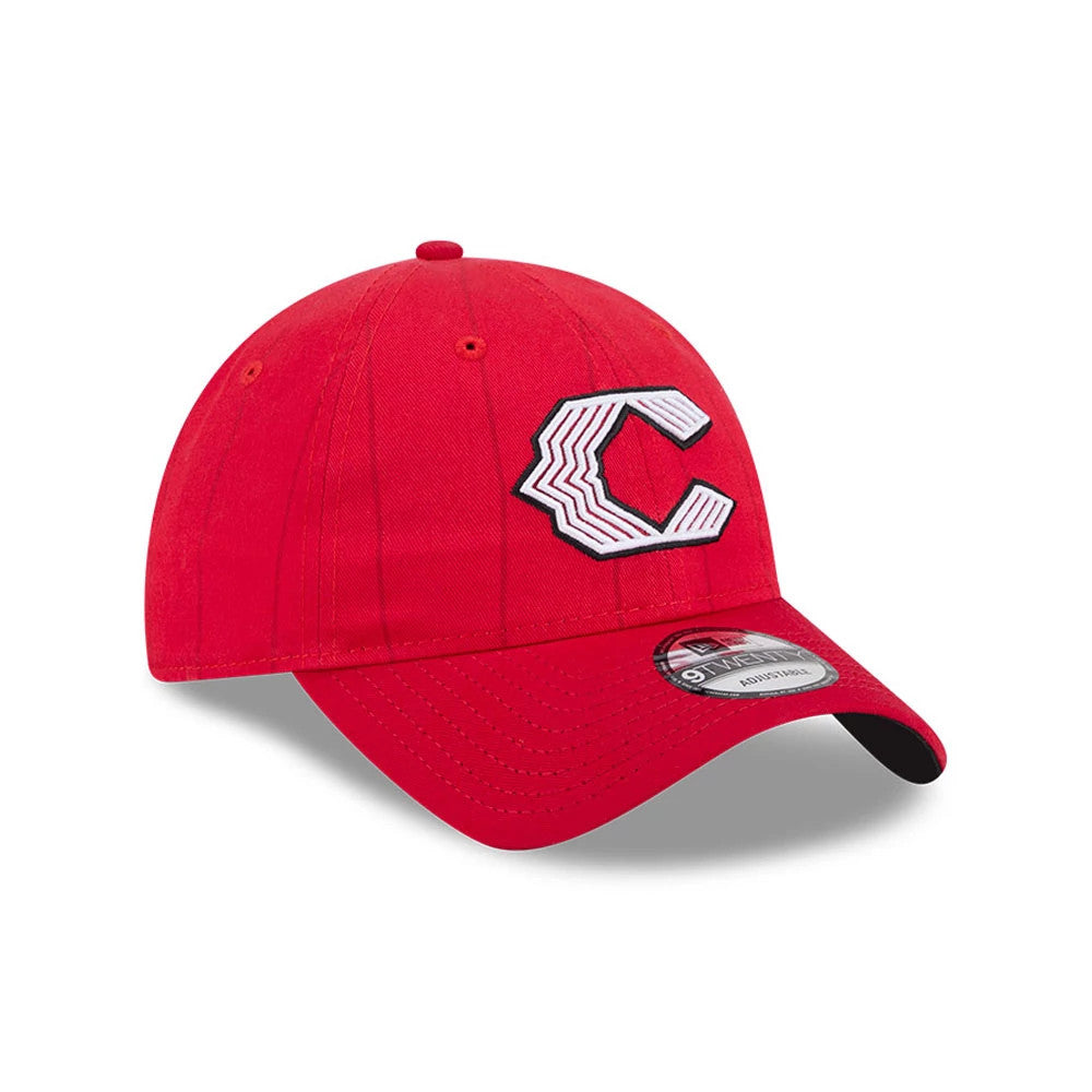 Cincinnati Reds MLB City Connect Red New Era 9TWENTY Adjustable Cap, three-quarter view showing a raised white and grey embroidered C logo on the red front panel, with a pre-curved red visor and a 9TWENTY size sticker on the top.