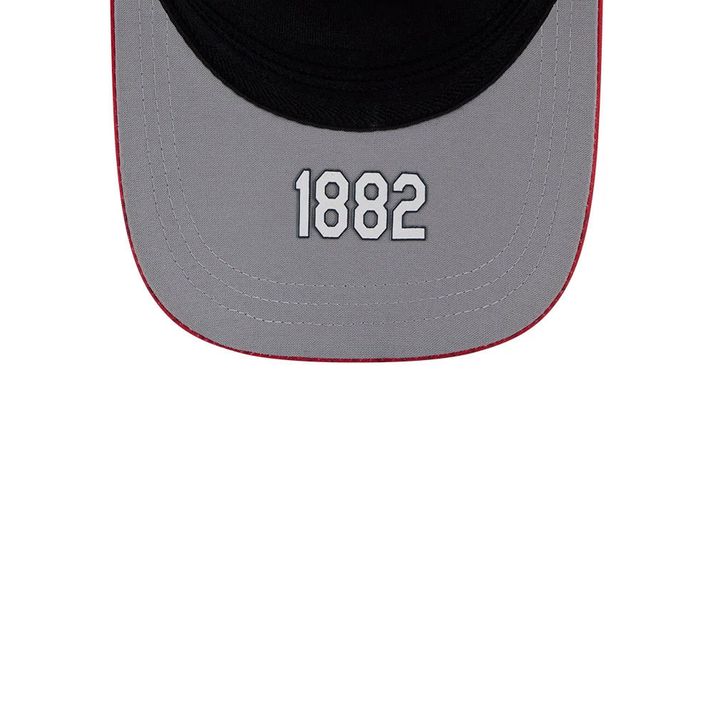 Cardinals MLB City Connect Red New Era 39THIRTY M-Crown A-Frame Stretch Fit Cap, close-up view showing the visor with grey fabric and red trim, featuring the white embroidered year 1882 at the centre, highlighting the detailed stitching.