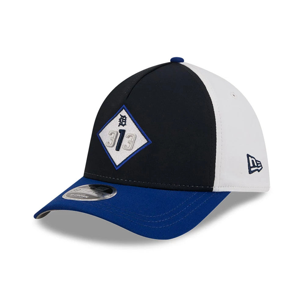 Tigers MLB City Connect Navy New Era 39THIRTY M-Crown A-Frame Stretch Fit Cap, three-quarter view showing the white embroidered D and 313 in a blue border diamond on the front panel, with a curved blue visor and New Era flag logo on the left side.
