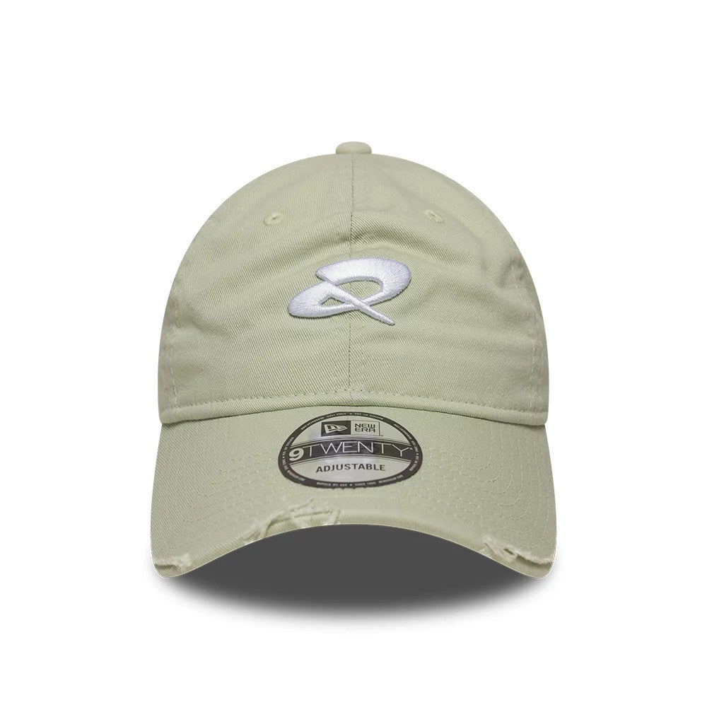 Quadrant X New Era Distressed Pastel Green 9TWENTY Cap, front view showing a white embroidered logo on the structured crown, a slightly curved visor with a 9TWENTY size sticker, and distressing details along the visor edge.