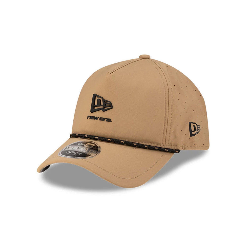 New Era Beige 9FORTY Apex Cap, three-quarter view showing a black embroidered New Era front logo, adjustable strap at the back, and side panels, with a curved visor featuring a 9FORTY size sticker.