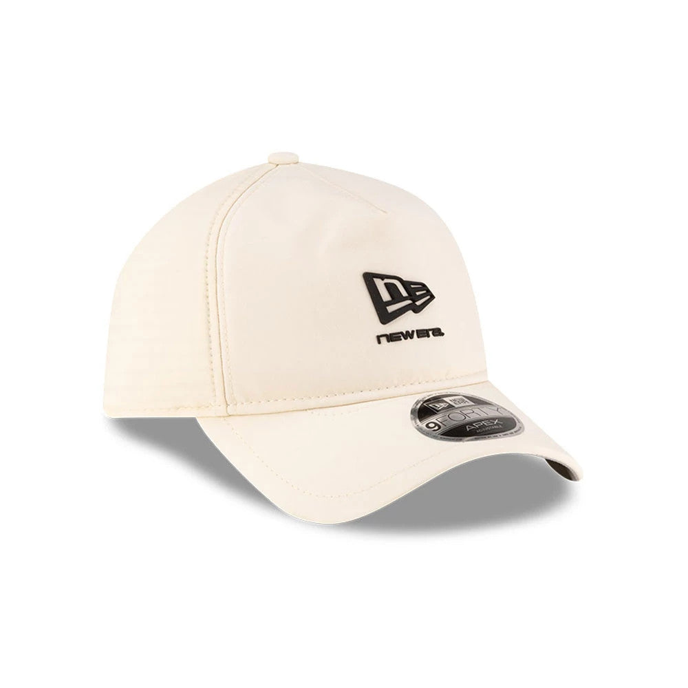 Pictured is this New Era 9FORTY Apex cap in light beige. 4