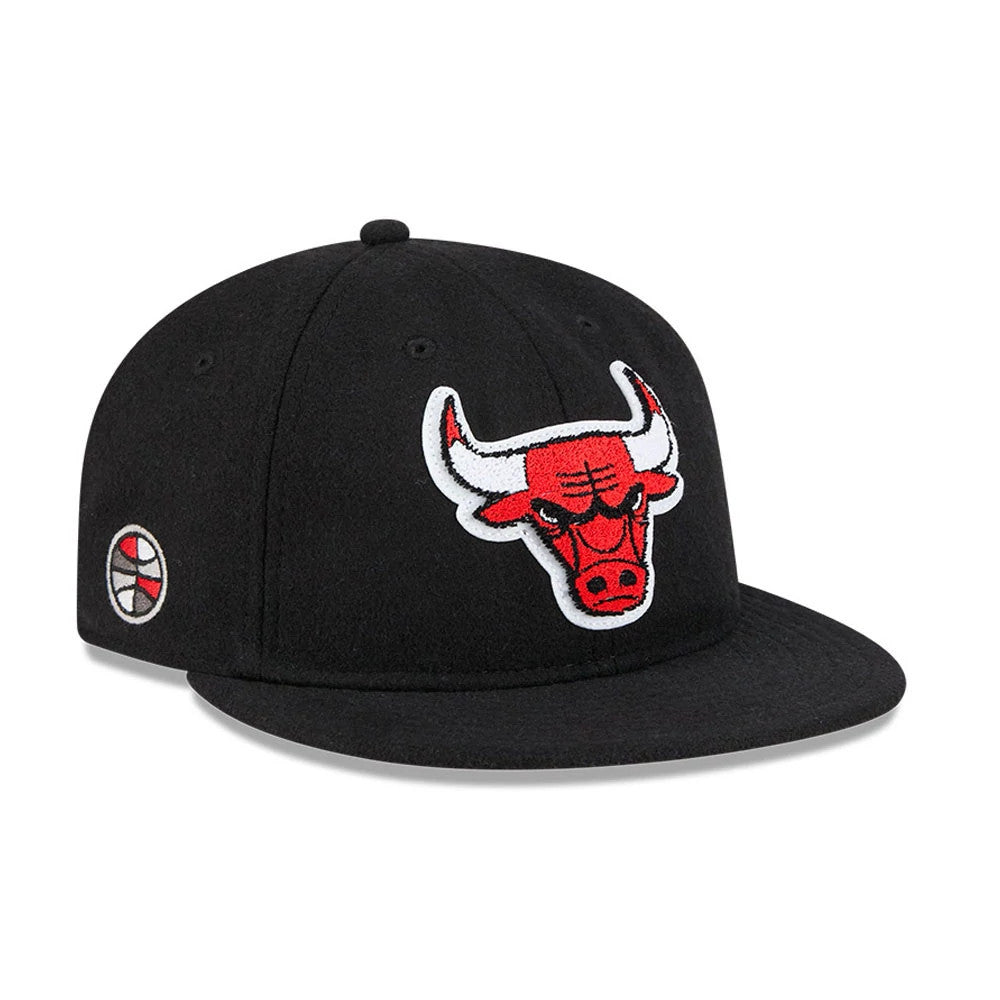 Chicago Bulls NBA Chenille Woven Black Retro Crown New Era 9FIFTY Adjustable Cap, front view showing the raised red and white embroidered bull logo on the front panel, flat black visor, and the New Era flag logo on the left side.