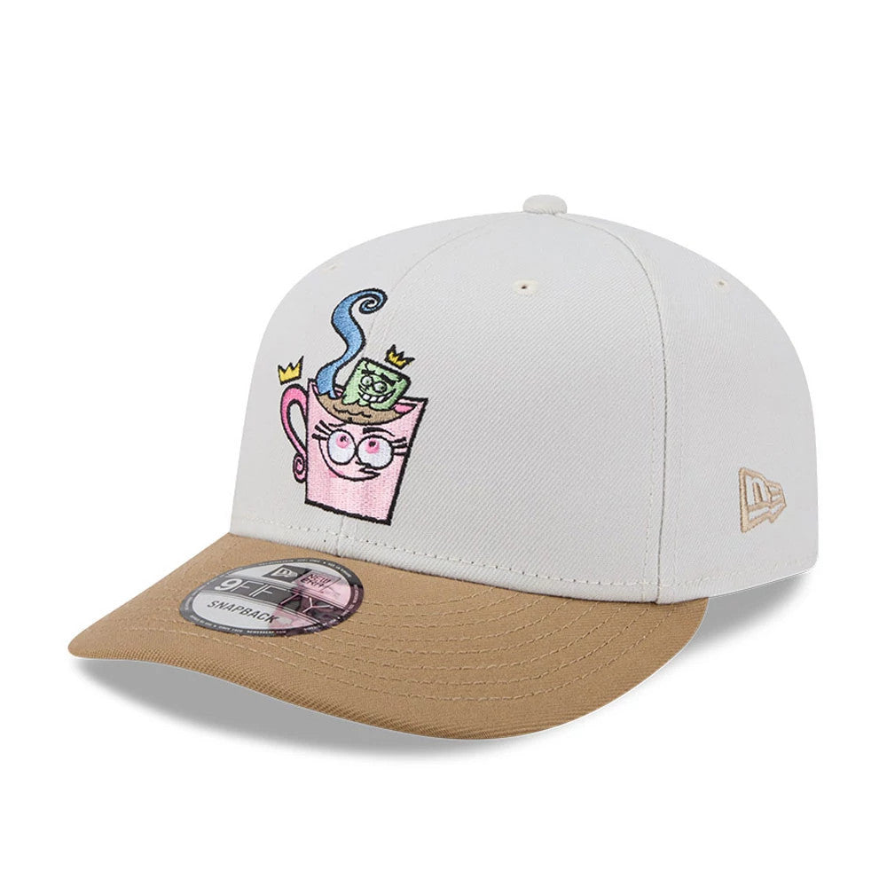 Nickelodeon Fairly Oddparents Light Beige New Era 9FIFTY Snapback Adjustable Cap, front view showing a colourful embroidered design of two characters in a pink teacup on the front panel, with a contrasting light brown visor.