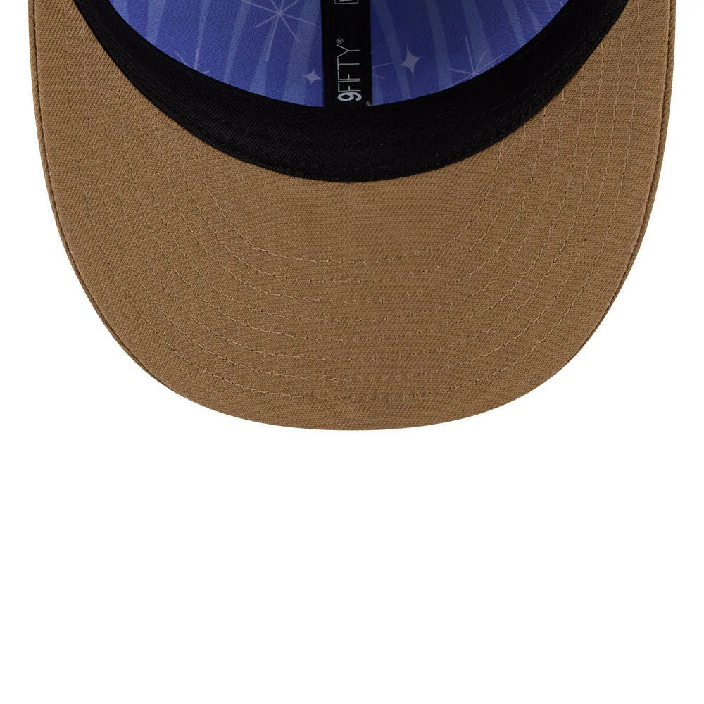 Nickelodeon Fairly Oddparents Light Beige New Era 9FIFTY Snapback Adjustable Cap, inside view showing a light beige visor with stitching, a blue patterned undervisor with star motifs, and a black sweatband featuring the 9FIFTY label.