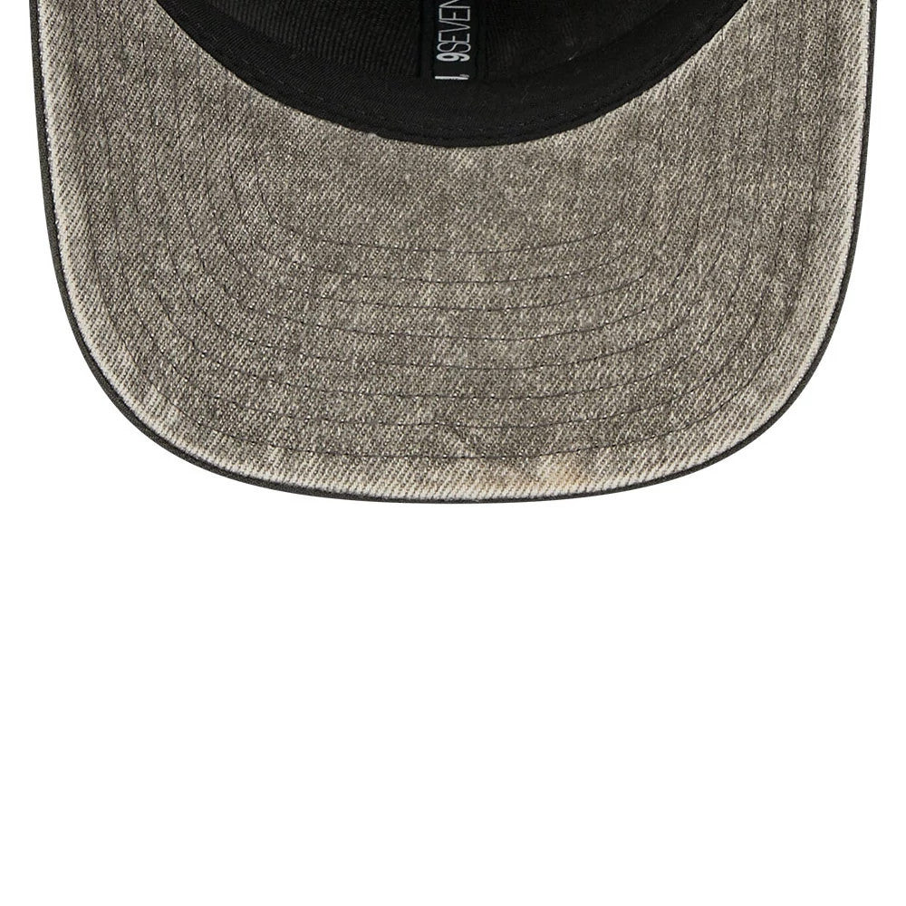 Philadelphia Eagles NFL Washed Denim Dark Grey New Era 9SEVENTY Stretch Snap Cap, inside view showing the dark grey washed denim-effect visor with stitch lines, a black sweatband with 9SEVENTY branding, and a black undervisor.