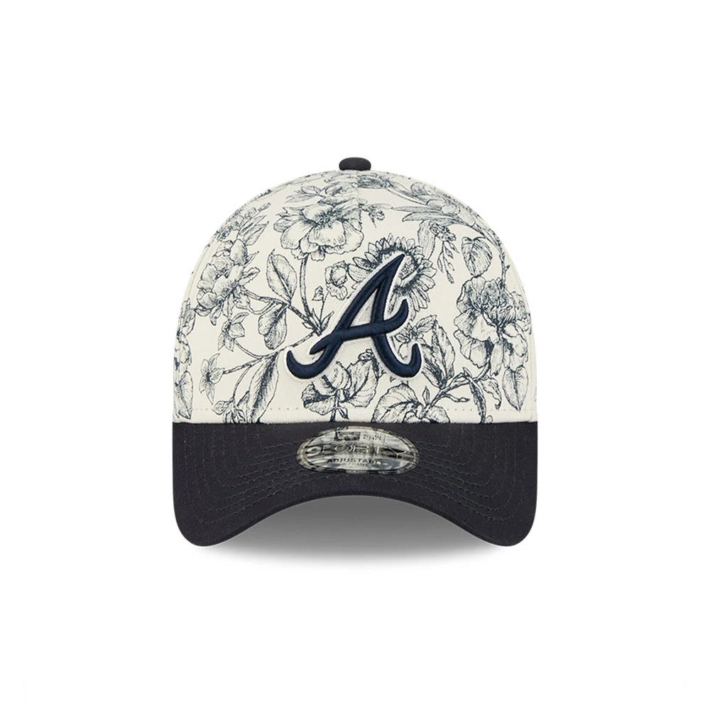 Atlanta Braves MLB Spring Floral Navy New Era 9FORTY A-Frame Adjustable Cap, front view showing a navy embroidered Braves A logo on the patterned floral crown, a navy curved visor, and a 9FORTY size sticker centrally placed on the visor.