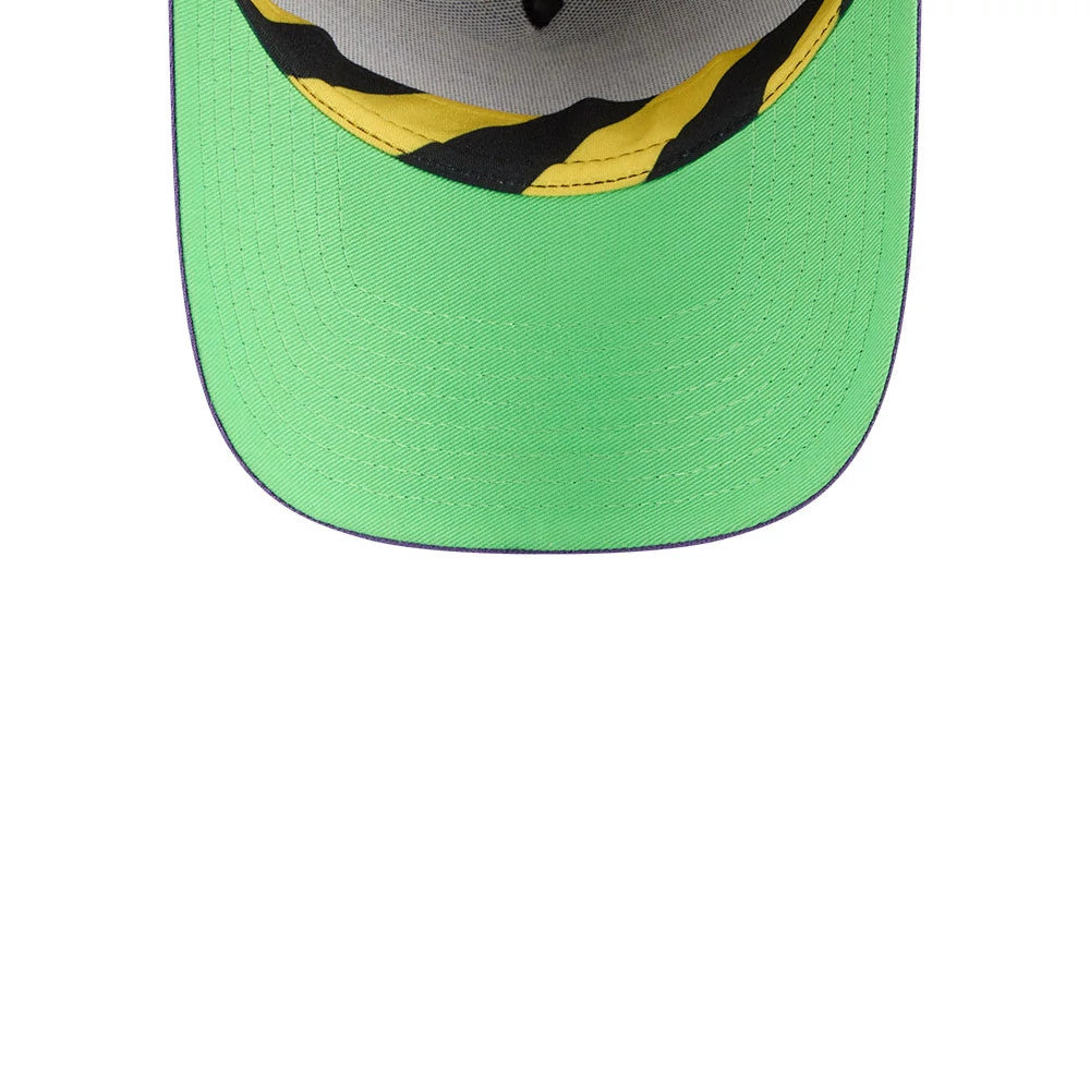 Dexter's Laboratory Dex-Transformer Black New Era 9FORTY A-Frame Cap, inside view showing a bright green undervisor, grey inner crown, and distinctive yellow-and-black striped taping running along the seams for a unique design feature.